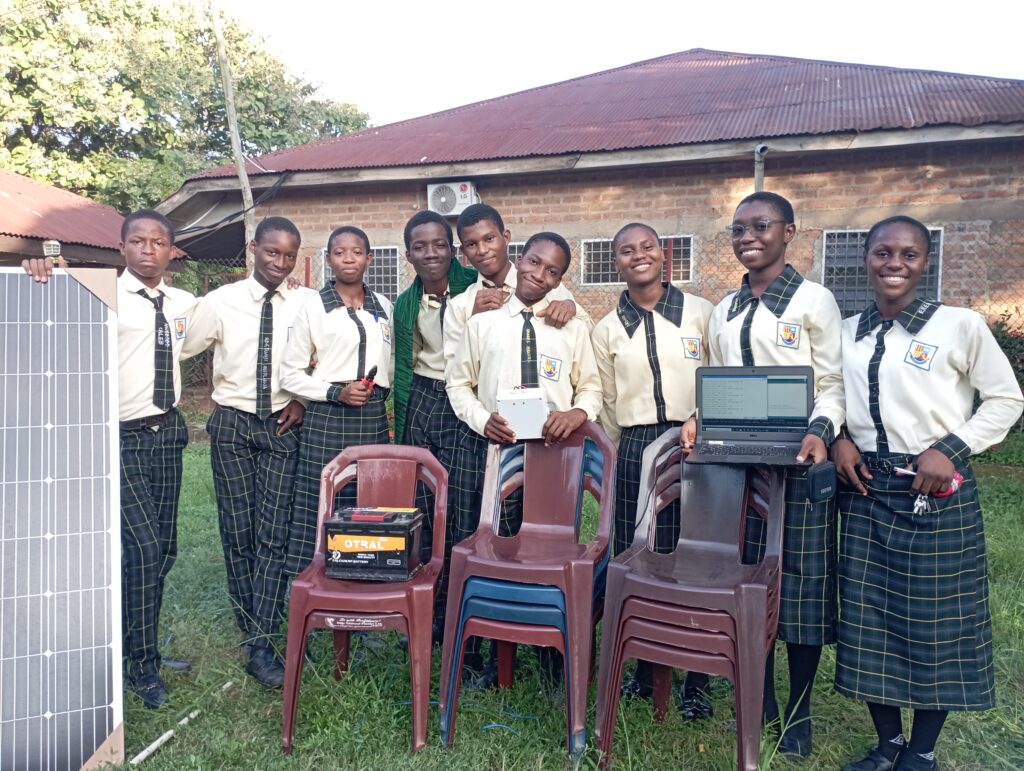 students with a solar system